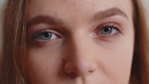 Closeup Macro Portrait of Beauty Young Beautiful Woman's Eyes Smiling Model Looking at Camera