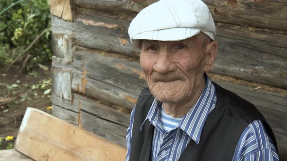 Portrait of an Old Grandfather with Deep Wrinkles