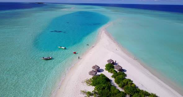 Luxury fly over abstract view of a summer white paradise sand beach and aqua turquoise water