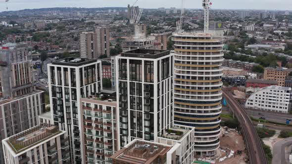 Slide and Pan Footage of Apartment Buildings in Modern Residential Complex