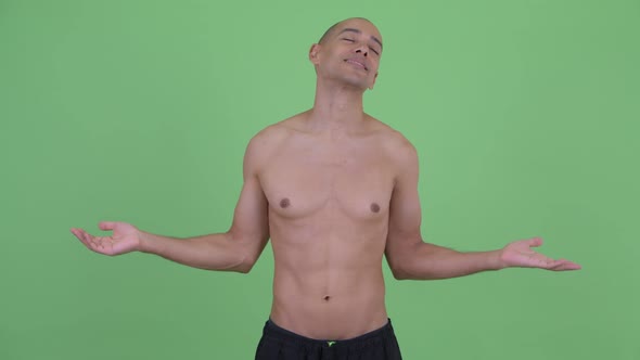 Happy Bald Multi Ethnic Shirtless Man Relaxing with Eyes Closed