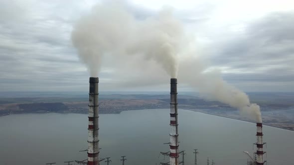 Aerial View of High Chimney Pipes with Grey Smoke From Coal Power Plant