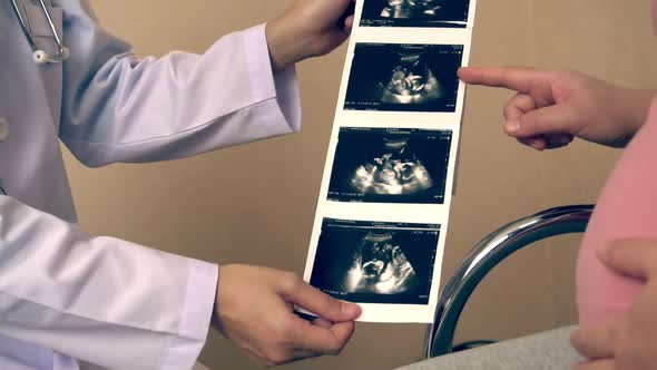 Pregnant Woman and Gynecologist Doctor at Hospital