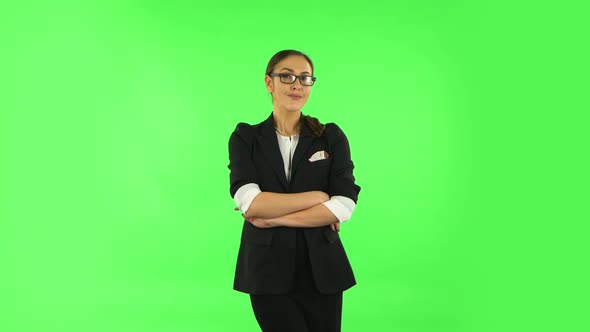 Woman Smiling While Looking at Camera. Green Screen