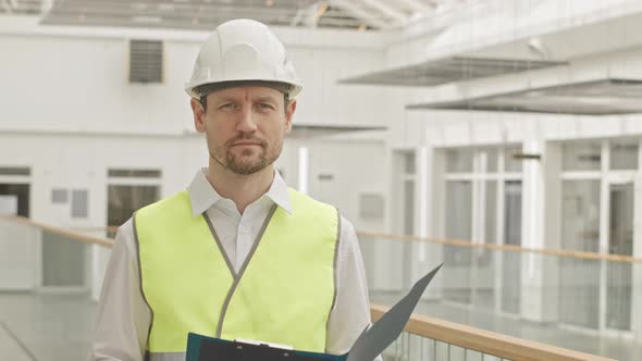 Portrait of Engineer Standing at Construction Site