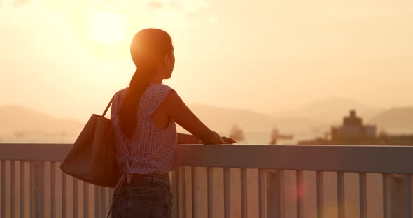 Woman enjoy the sunset time