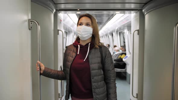 Vaccinated Masked Woman in Train Subway on Commute to Work