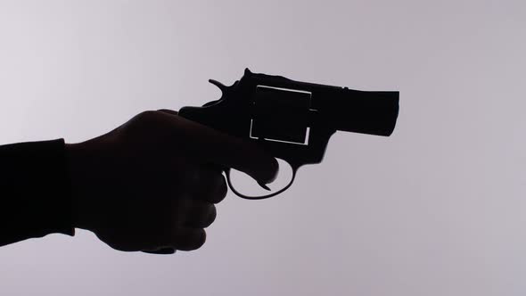 Man Shoots From the Gun