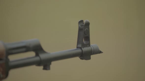 Rifle Shooter During Shooting. Close-up