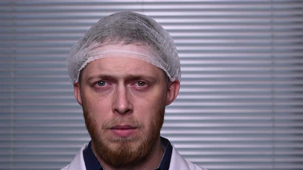 Close-up of a male medical worker wearing a mask. Healthcare in an epidemic