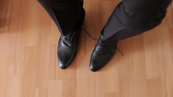 A Businessman is Wearing Black Leather Shoes