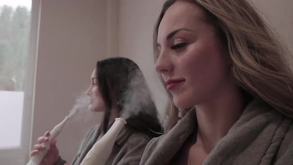 Mineral Water Inhalation Treatment, Two Young Woman in Wellness Spa Center, Close Up