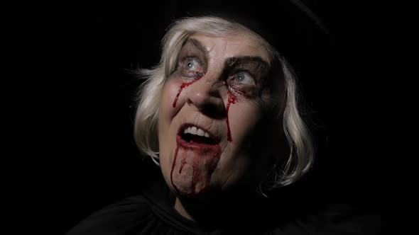 Old Witch Halloween Makeup, Elderly Woman Portrait with Blood on Her Face