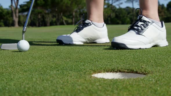 Golfer playing golf