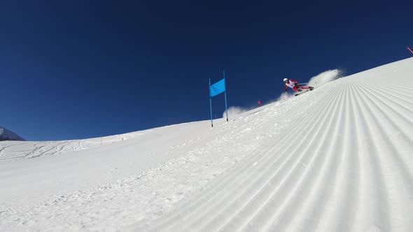 Low Angle View Professional Giant Slalom Skier During Training on Ski Piste