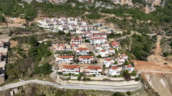 Complex of villas in the mountains aerial view 4 K