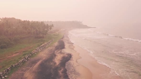 Sandy beach in Kerala, India. Static aerial drone view