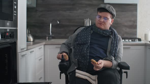 Man with Disability Trying Homemade Cookie