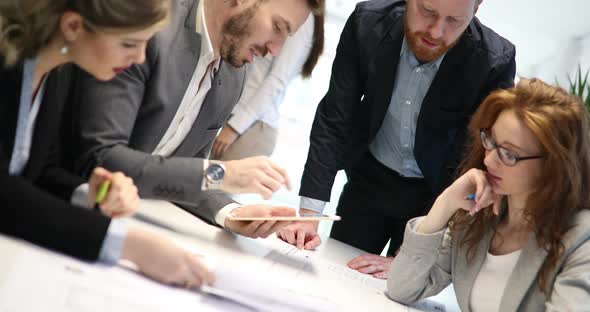 Group of Business People Collaborating in Office