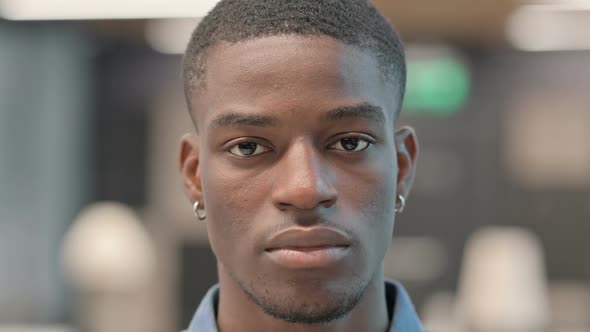 Face of Young African American Man Looking at the Camera