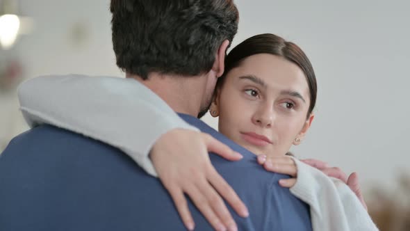 Sad Woman Hugging Man Hispanic Couple