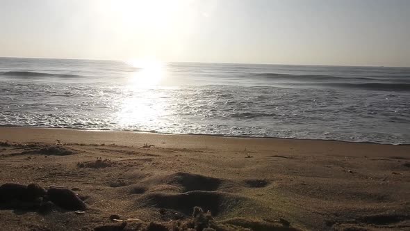 Beautiful Beach sunset, with majestic sky light being reflected. Sunrise beach. sunrise ocean waves.