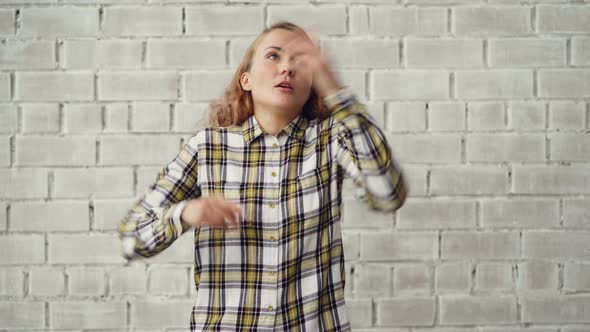 Portrait of Stressed Young Woman Screaming and Gesturing Expressing Negative Emotions Then Going