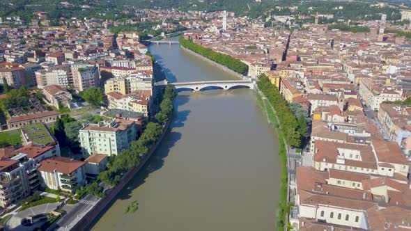 Verona, Italy: Aerial view of river and Bridges.Drone flies over the Adige river.Aerial video in 4K