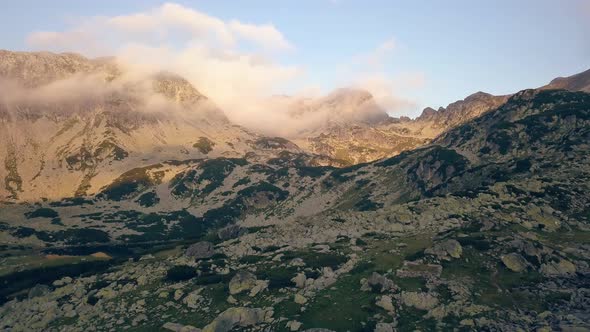 Wide shot of aerial drone view of Retezat Mountains, Romania