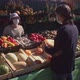 Buying Pumpkins at the Market. Slow Motion 2x. - VideoHive Item for Sale