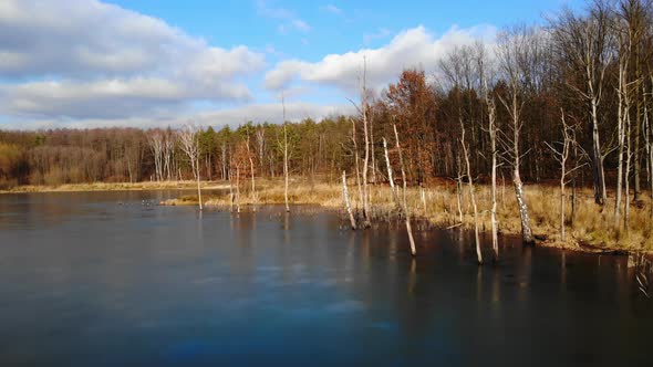 Mining excavation flooded with water.