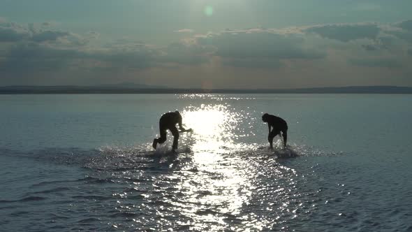 Happy Kids Running On The Salt Lake Slow Motion 3