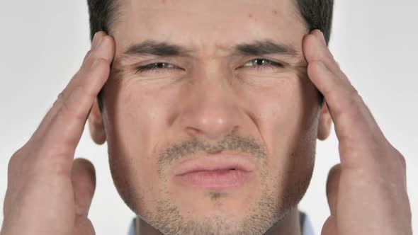 Close Up of Man with Headache and Stress