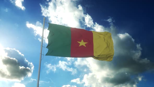 Flag of Cameroon Waving at Wind Against Beautiful Blue Sky