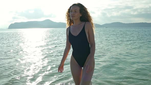 Woman on Balck Swimwear Walking in Slowmo Koh Tean Beach