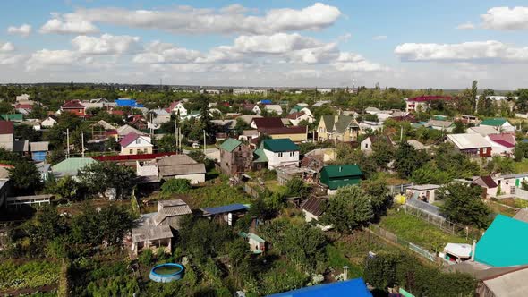 Flight Over Small Town On Sunset in Russia