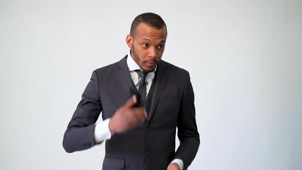 Professional African-american Business Man Talking on Mobile Phone and Holding Bank Credit Card