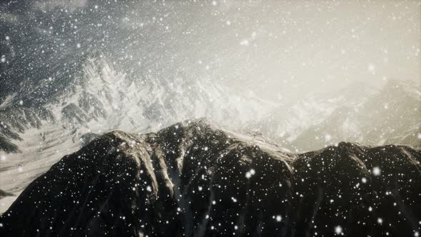 Heavy Snowing, Focused on the Snowflakes, Mountains in the Background