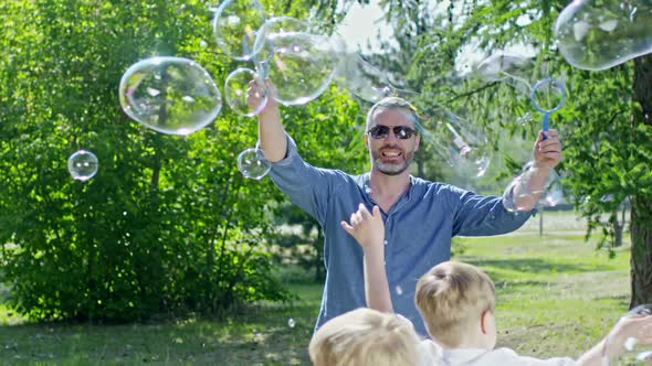 Bubble Artist Showing Tricks for Little Kids