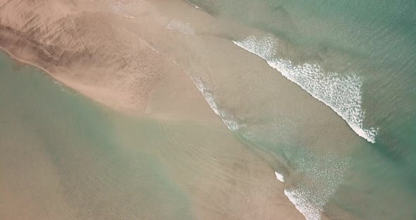 Beautiful beach with sea transparent clean water on both sides. Island concept travel destination.