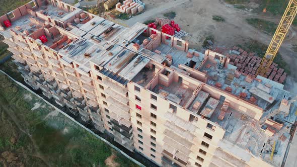 Aerial View of the Construction Site of a Residential Building at Dawn on a Summer Day