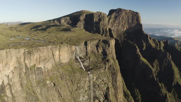 Aerial View of people camp at the Torceira Pico waterfalls on the mountain.