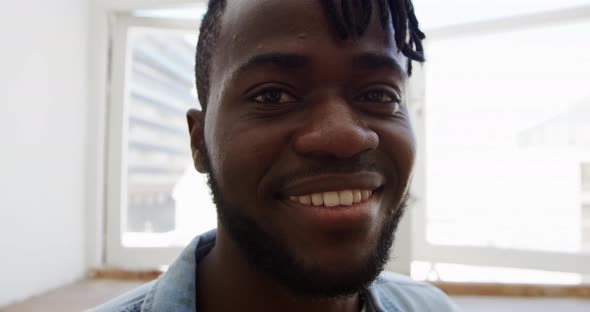 Portrait of a man at home smiling