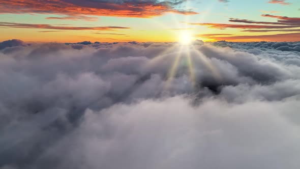 Breathtaking Sunrise Above the Clouds