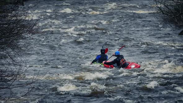 Kayaks On River Rapids