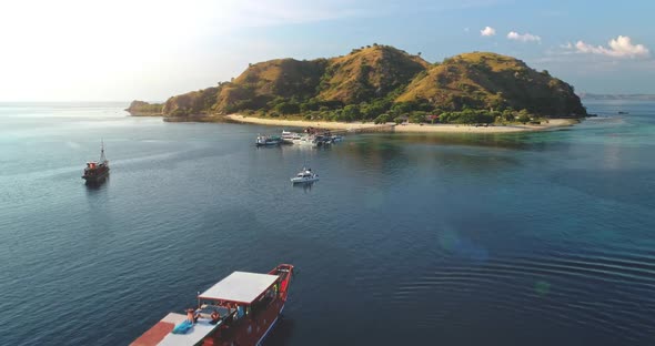 Cruise Liner Sail to Island on Ocean Bay Aerial