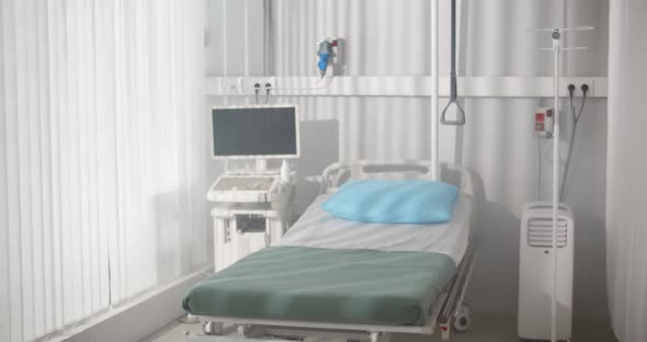 Clean and Empty Room with a Bed in New Medical Center