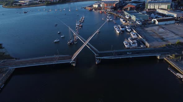 Twin Sails Bridge in Poole opening up for boats to sail through2