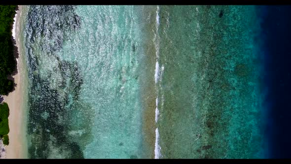 Aerial drone seascape of tranquil sea view beach break by blue ocean with white sand background of a