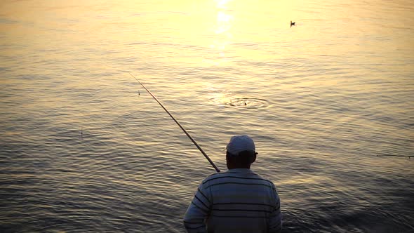 Fisherman Catches Fish Slow Motion